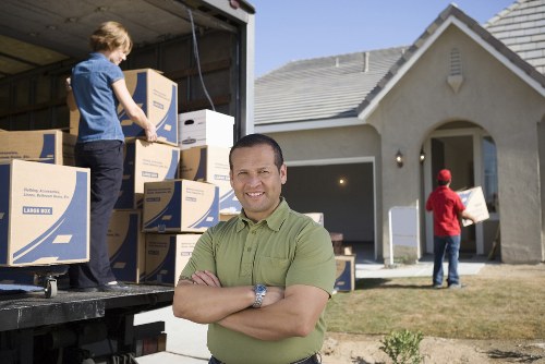 Professional local removals team packing boxes in Woodlands
