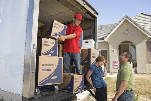 Removal van outside a home during house removals in Woodlands