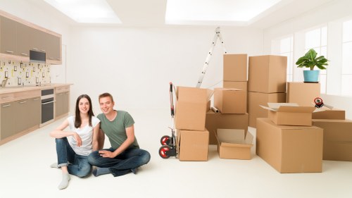 Moving boxes and furniture prepared for flat removals in Woodlands
